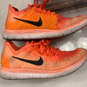 Orange / pink Nike Fly Knits